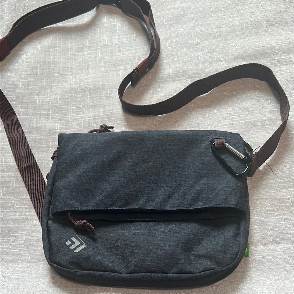Outdoor Bag with Adjustable Strap and Flap.